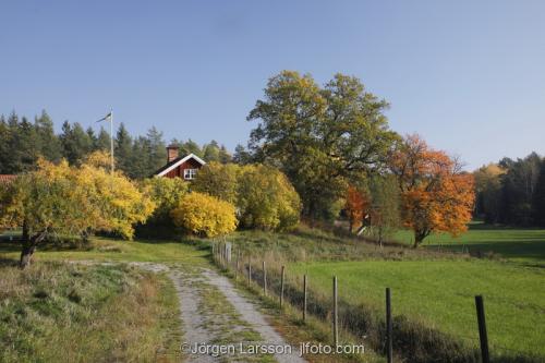 Morko Sodermanland Sweden autumn red house road 