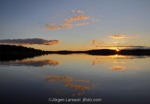 Nävelsö Småland solnedgång vatten kust stilla spegling 