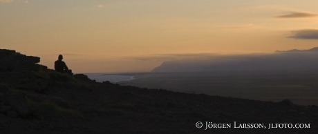 Dyrhólay  Iceland sunset vulkaner man