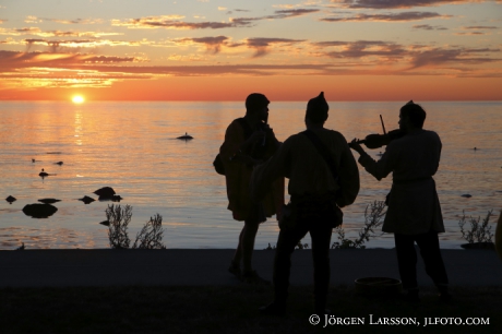 Spelmän i solnedgången