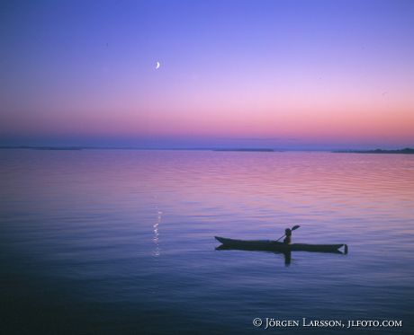 Canoe moonlight Sweden