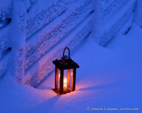 Lantern in snow