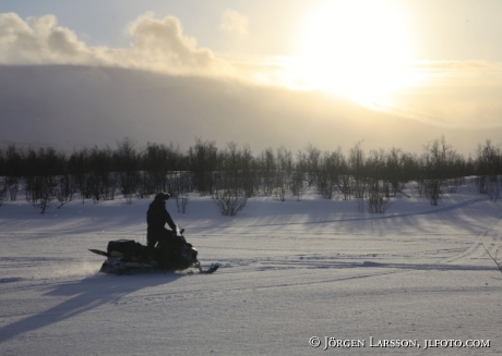 Snow scooter Nikkalokta Lapland Sweden 