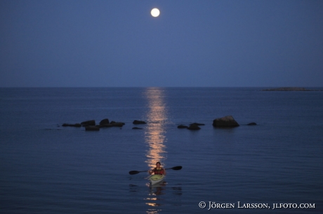 Canoeing in moonlight Smaland Sweden