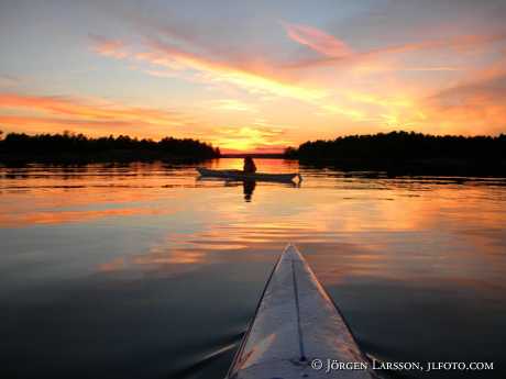 Canoing in sunset Smaland Sweden